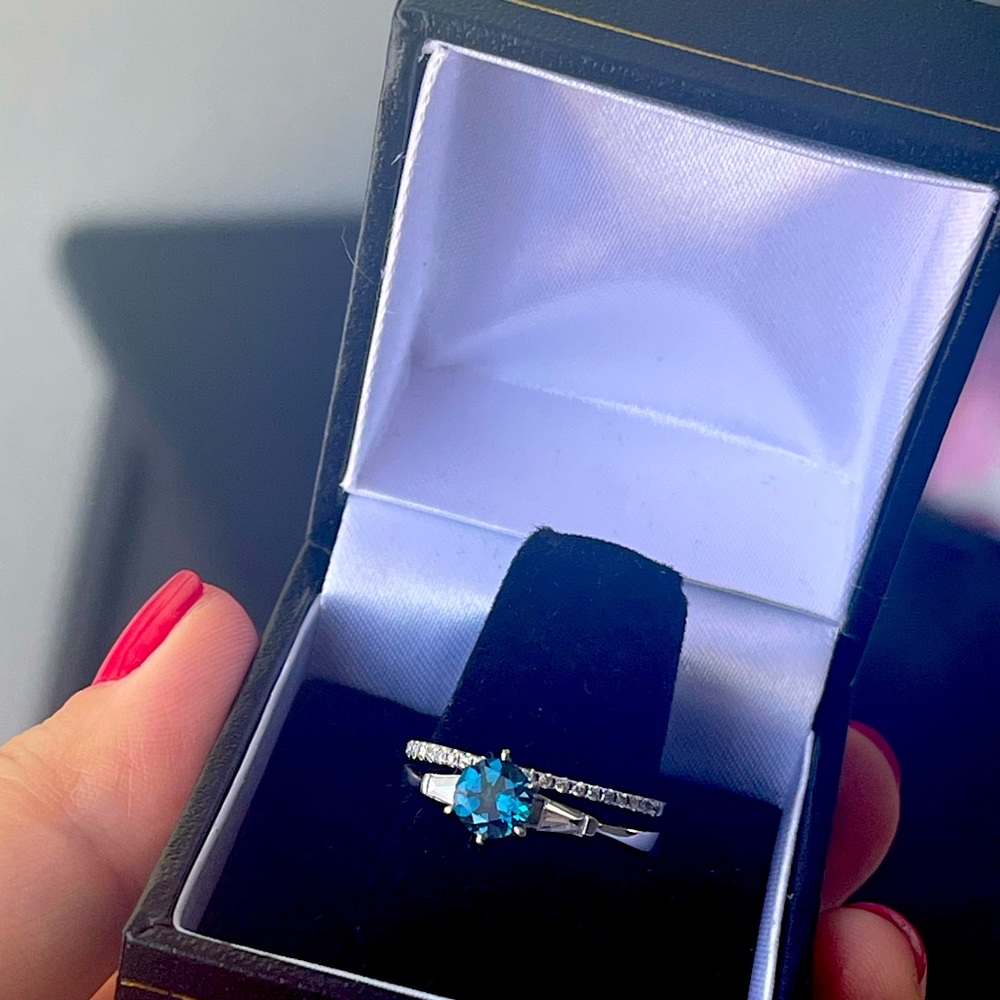 14k white gold Diamond wedding set with a .75 London Blue Topaz